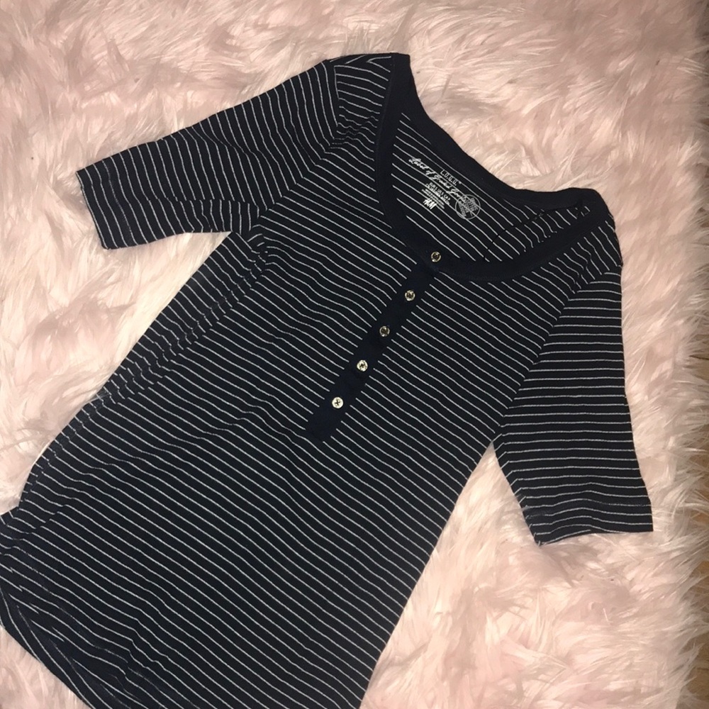 Dark blue and white striped organic cotton shirt.